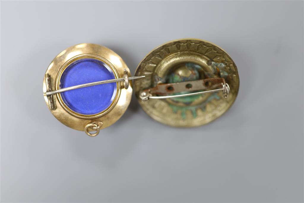 A Victorian yellow metal, enamel and cabochon banded agate set mourning pendant brooch, 30mm & 1 other.